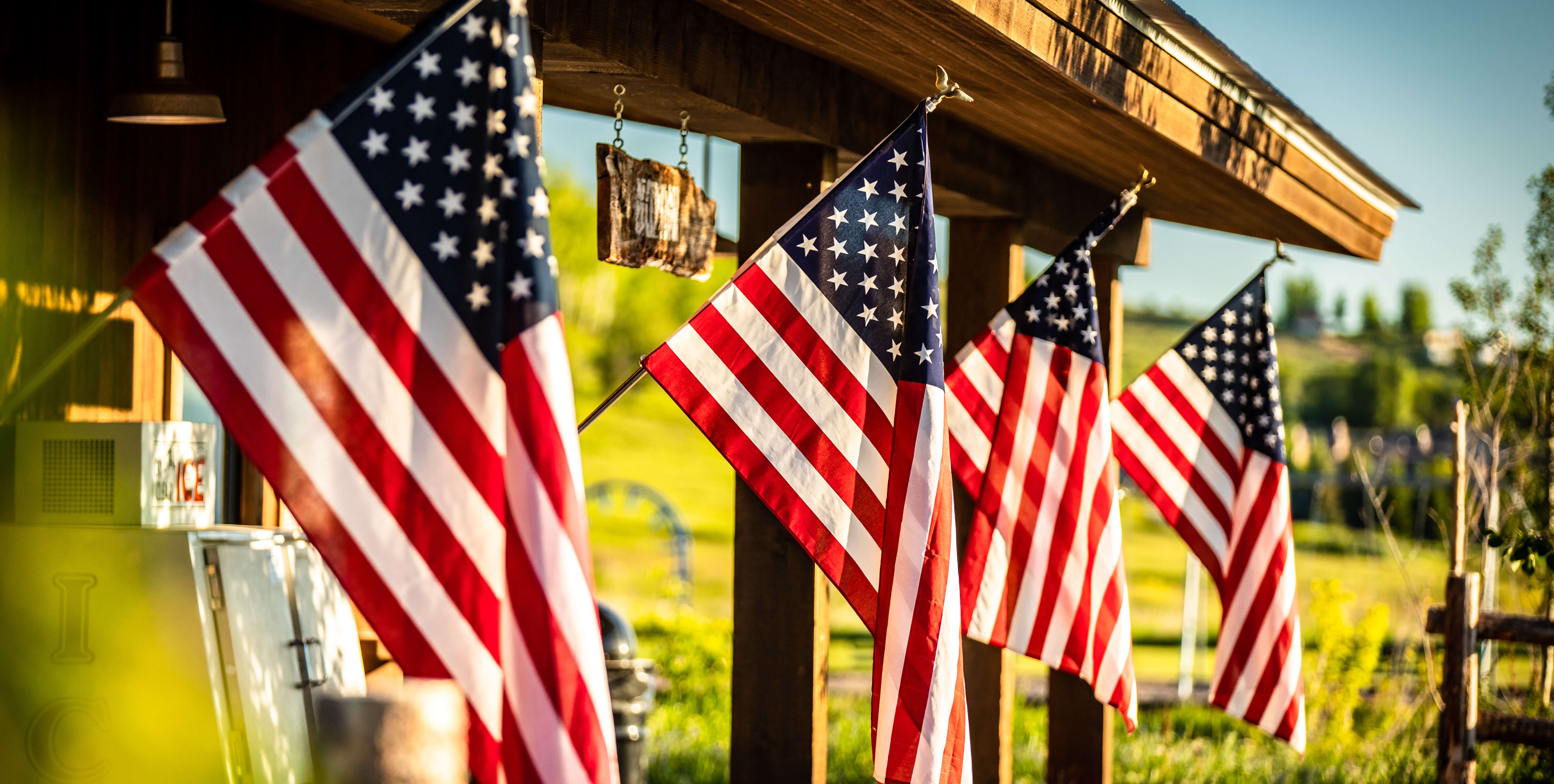 MainLodge-Outside-AmericanFlags